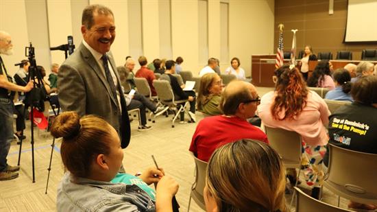 Congressman Garcia greets attendees at his Franklin Park town hall