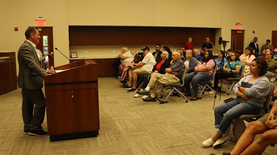 Congressman Garcia speaks to the crowd at his Franklin Park town hall 