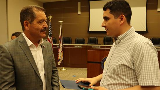 Congressman Garcia speaks with an attendee at his Franklin Park town hall
